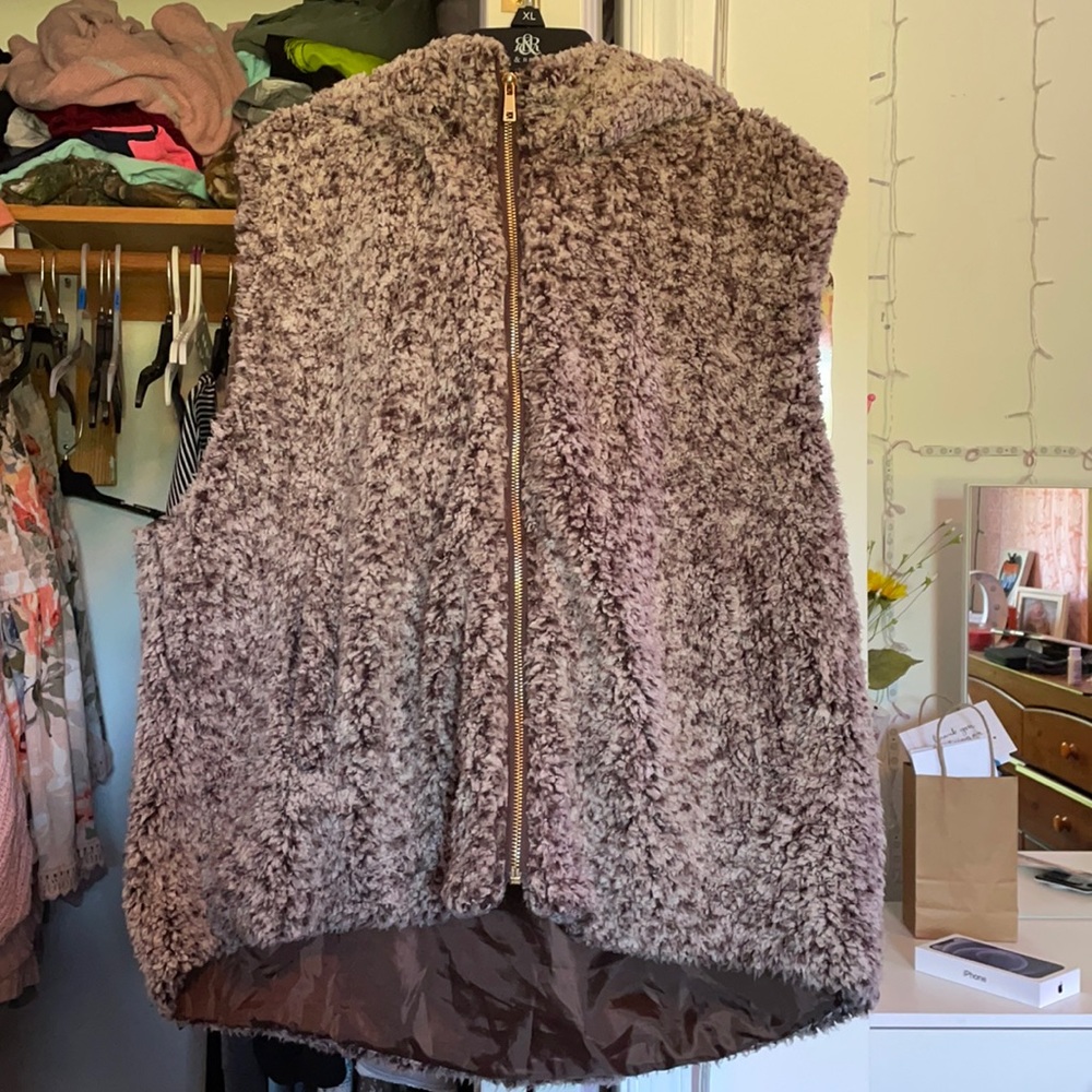 Dark purple vest with hood